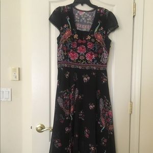 Black cap sleeve dress with flower pattern